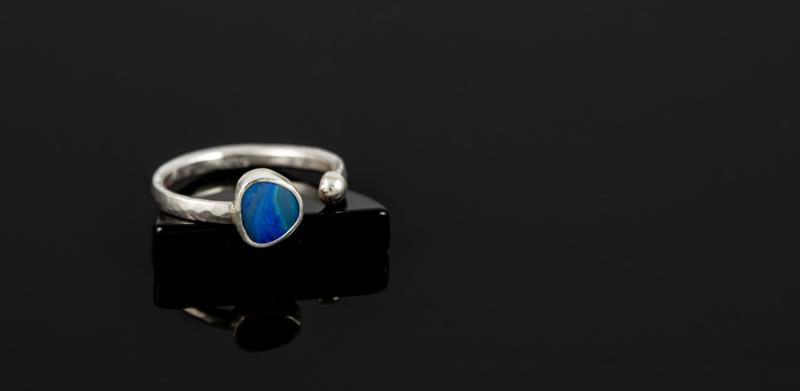 Silver ring with a blue opal stone