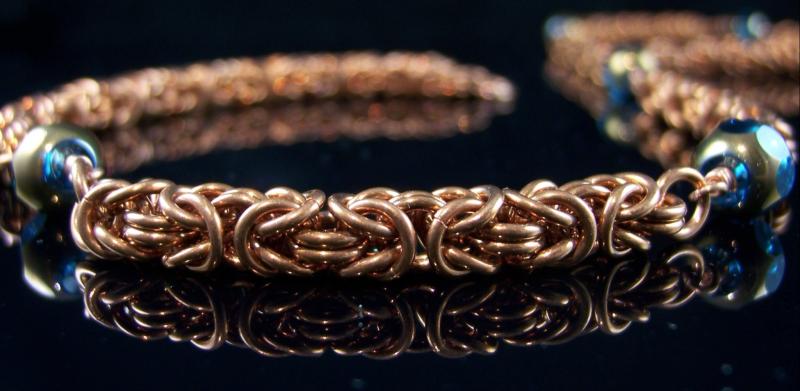 An intricate copper bracelet