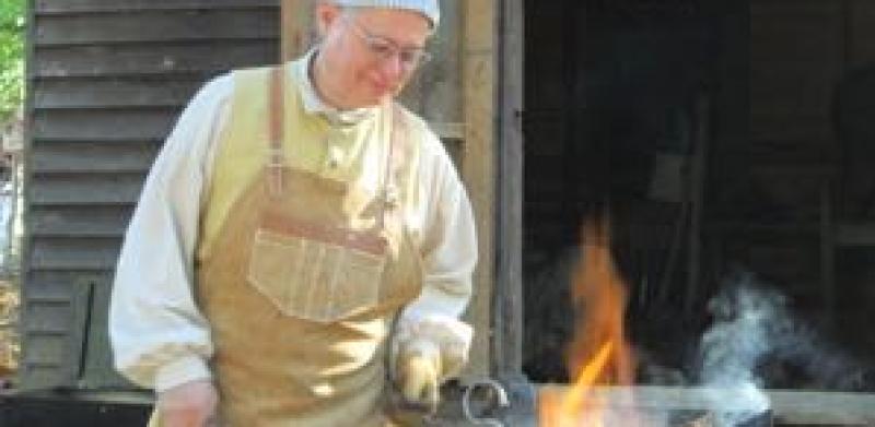 Man doing a blacksmithing demo