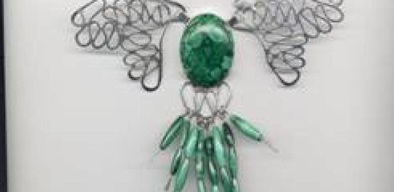 Silver jewelry with green stones