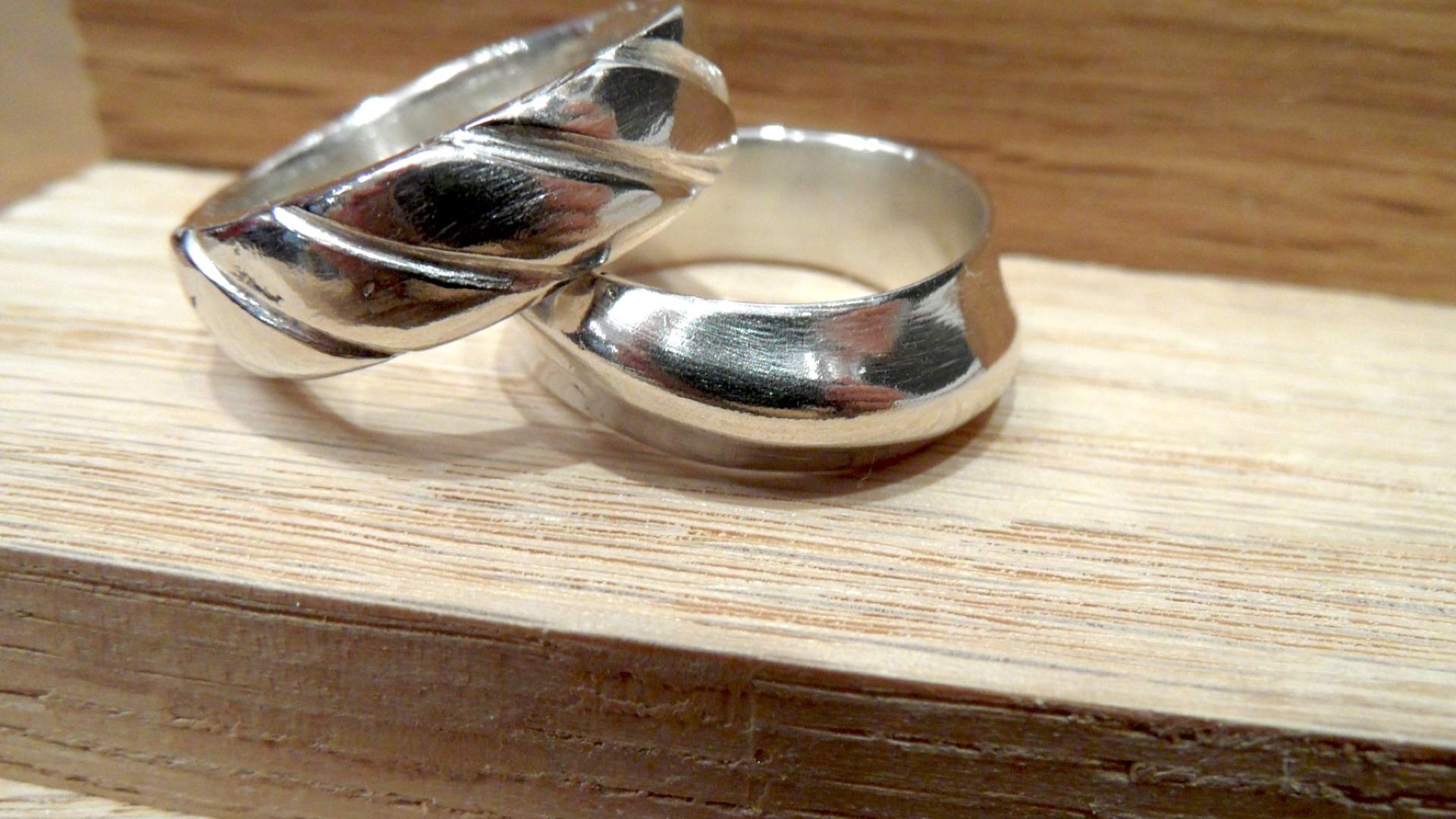 Two cast silver rings