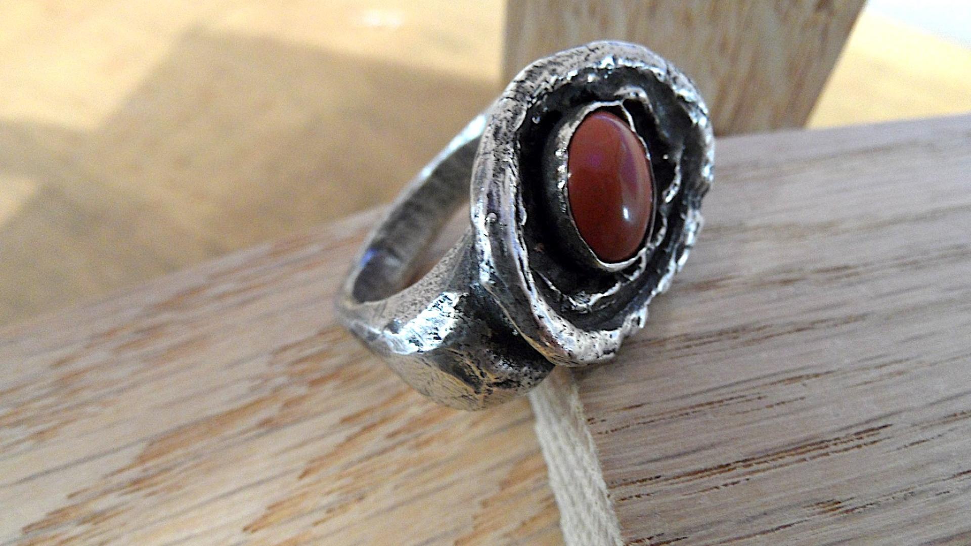 Cast silver ring with red stone