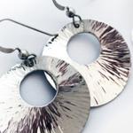 Circular textured silver earrings