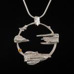 silver necklace with pointed silver cast pieces