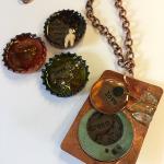 bottle caps and copper pieces in resin