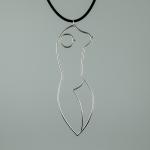 Photograph of a silver wire pendant shaped like a female torso on a black cord.